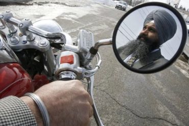 Sikh Baljinder Badesha rides without a helmet turban
