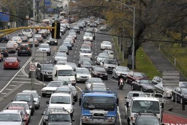Bike lanes lane filtering ride to work tax congestion
