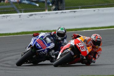 Jorge Lorenzo and Marc Marquez in action motorcycle insurance
