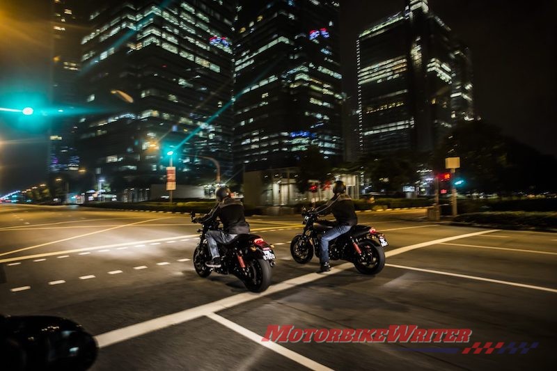 Harley-Davidson Street Rod Singapore traffic congestion night motorcycles moon