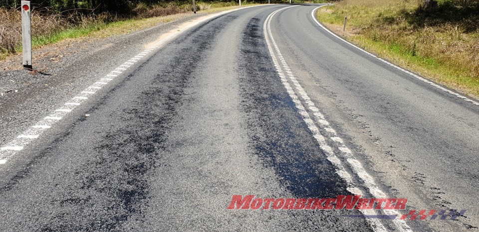 Melting tar on Oxley highway sand fix