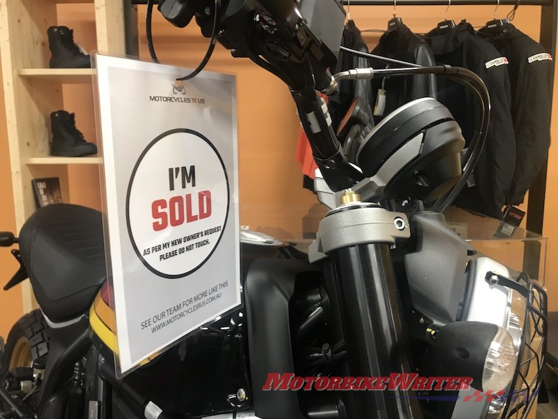 Ducati test ride demo motorcycle sales showroom selling motorcycles pace sales slide