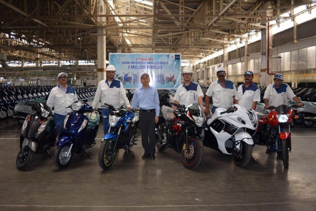 Senior Officials of Suzuki Motorcycles India showing off limited edition bikes