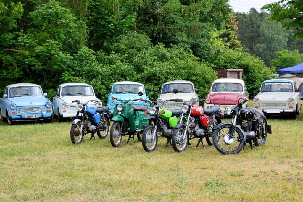 Old cars and motorcycles from a country in East Germany