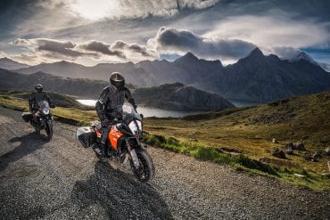 A rider takes his KTM motorcycle on a long trip in Norway
