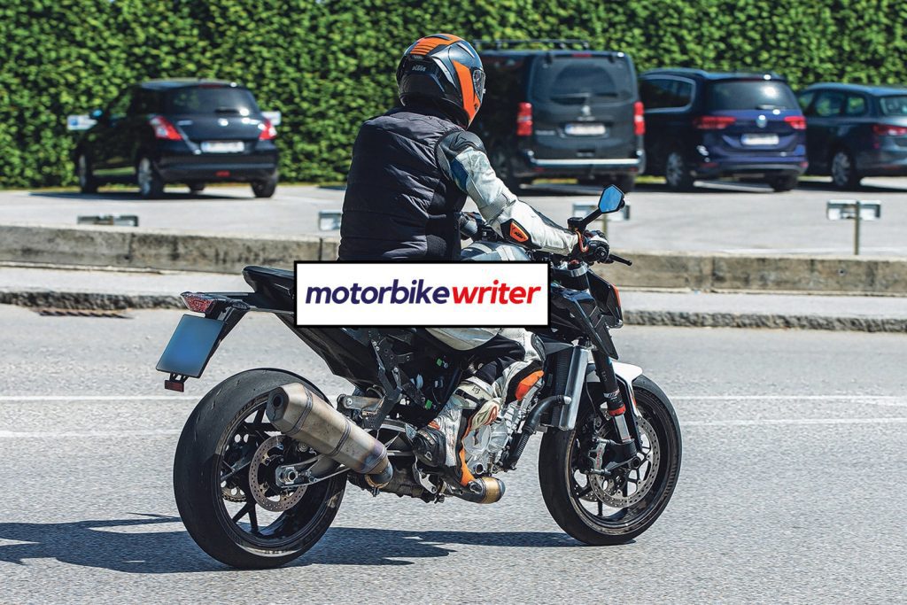 a back right view of spy shots taken of a new KTM machine