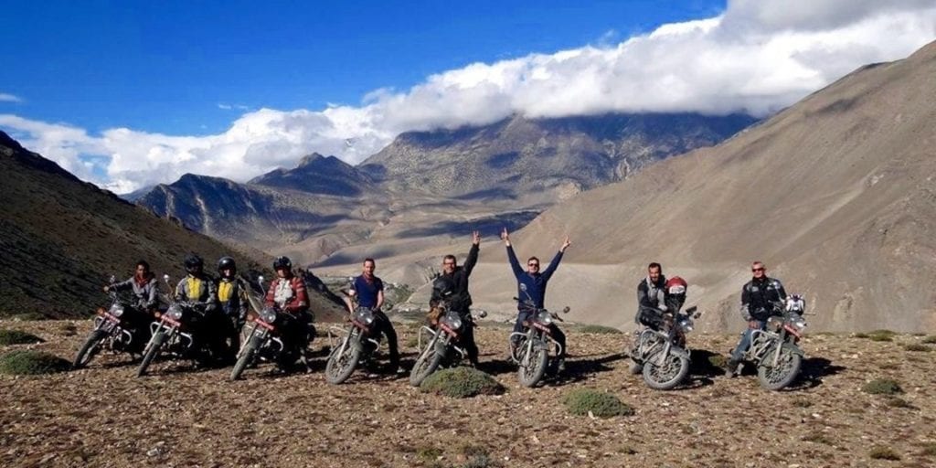 a group of riders enjoying their travels through Nepal