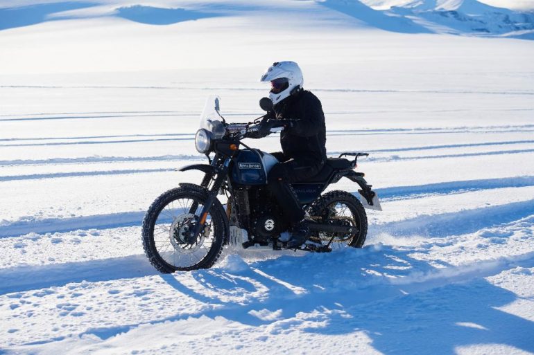 An image of a rider in Iceland, testing the Royal Enfield HImalayan that is set to ride to the South Pole