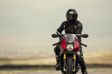Rider on 2022 Triumph Speed Triple RR with red fairing