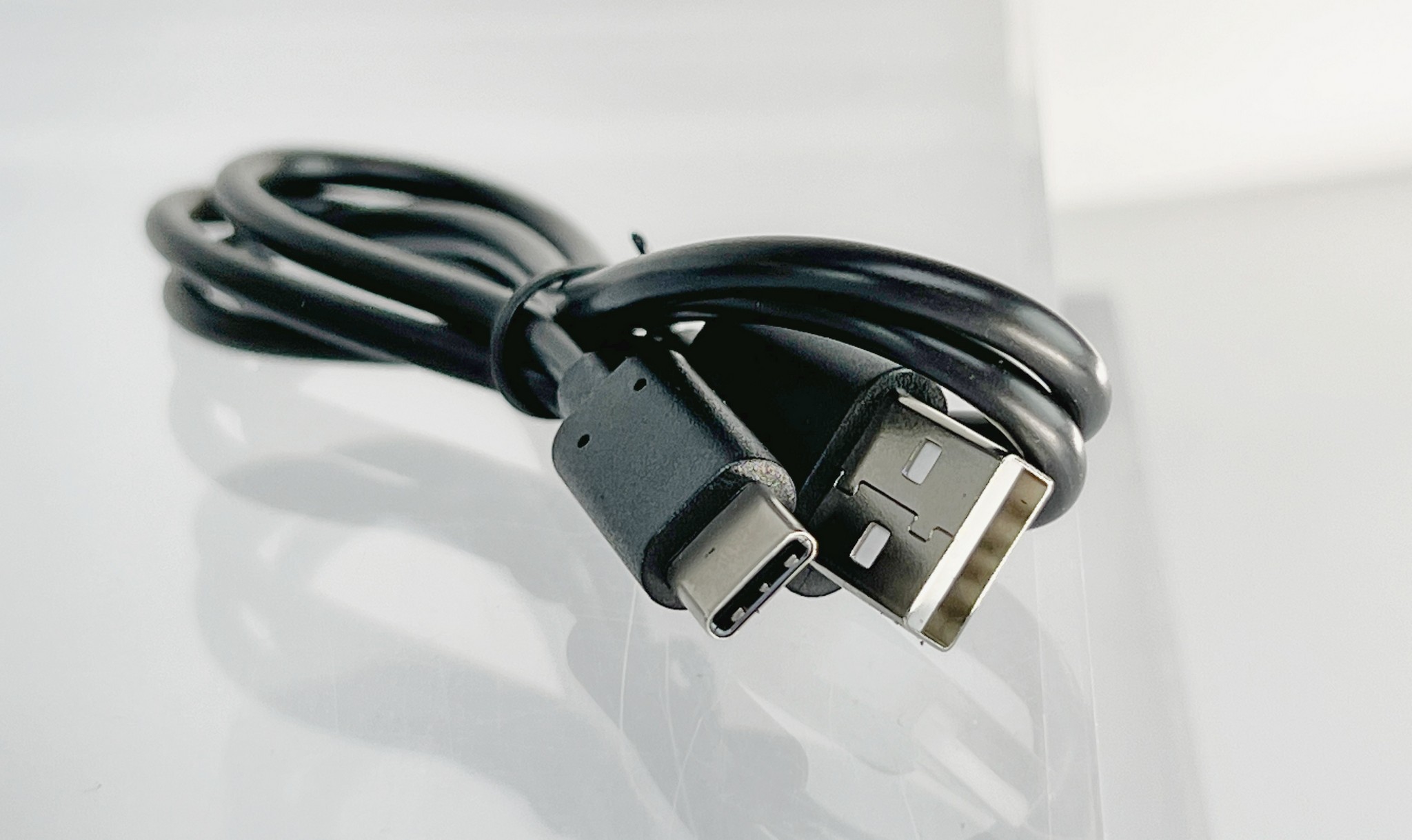 The USB C-type charging cable from the Cardo Packtalk Edge.